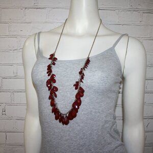 Beautiful gold and dark red charm necklace by ECT! 34-37"